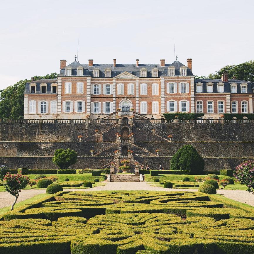 A wide shot of Chateau de Sassy, home of Maison Sassy cider apples