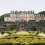 A wide shot of Chateau de Sassy, home of Maison Sassy cider apples